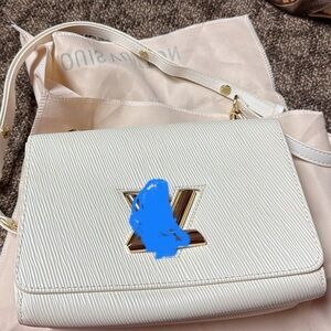 Elegant White Clutch with Gold Accents